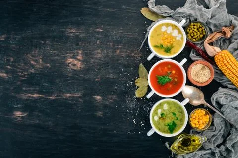 Set of hot, colored vegetable soups. Broccoli soup, corn, tomato soup. Health Stock Photos
