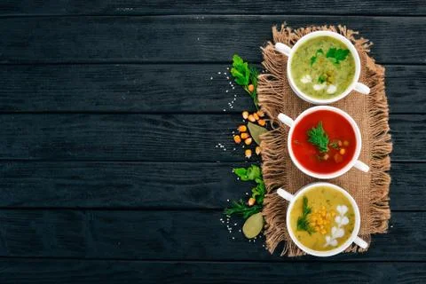 Set of hot, colored vegetable soups. Broccoli soup, corn, tomato soup. Health Stock Photos