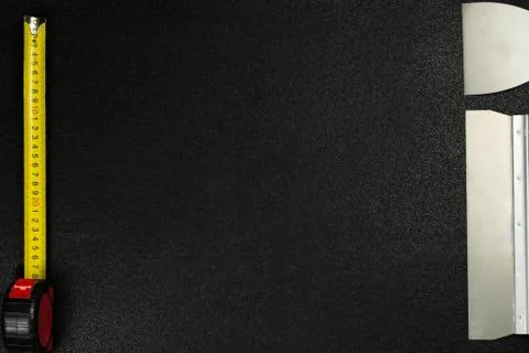Set of house painter tools on black background with copy space, top view, fla Stock Photos