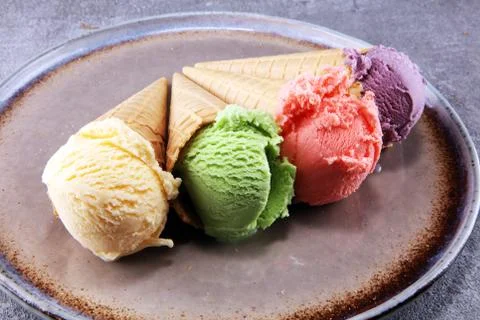 Set of ice cream scoops of different colors and flavours Stock Photos