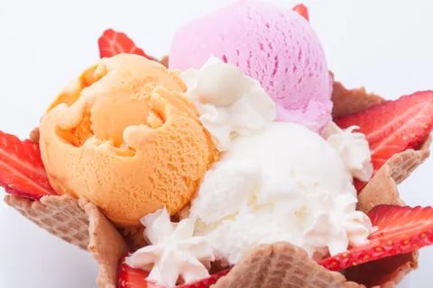 Set of ice cream scoops of different colors and flavours. Decorated with stra Stock-Fotos