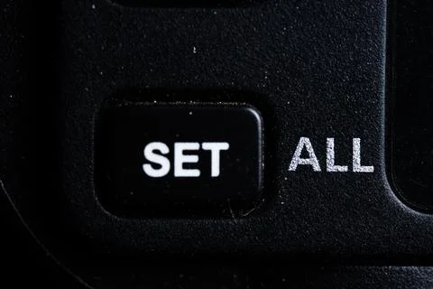 The Set icon button is close on the camera device. Old and dirty Stock-Fotos