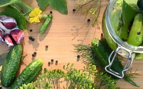 A set of ingredients for pickling cucumbers, pickled cucumbers, brine. Stock Photos