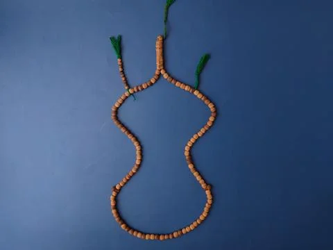 This is a set of Islamic prayer beads, also known as atasbih on a blue back.. Foto stock
