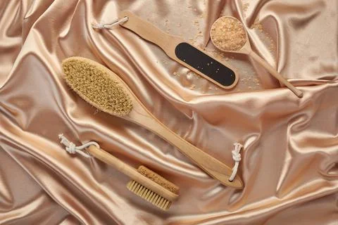 A set of items made of natural materials for body care in drapery. Self-care Stock Photos