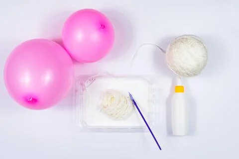 A set of items for making a handmade snowman. Scissors, threads, balls, glue Stock Photos