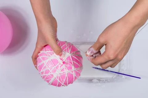 A set of items for making a handmade snowman. Scissors, threads, balls, glue Stock Photos