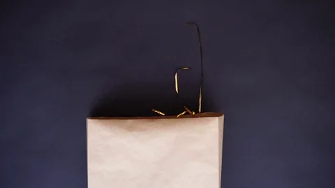 A set of items for the New Year party are moving on a black table. Stock Footage 82315666