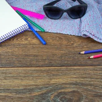 Set of items office mobile notebook sketch pencils markers eraser glasses Woo Stock Photos
