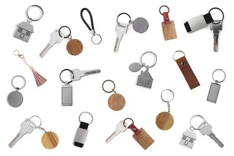 Set with keys and key chains isolated on white Foto stock