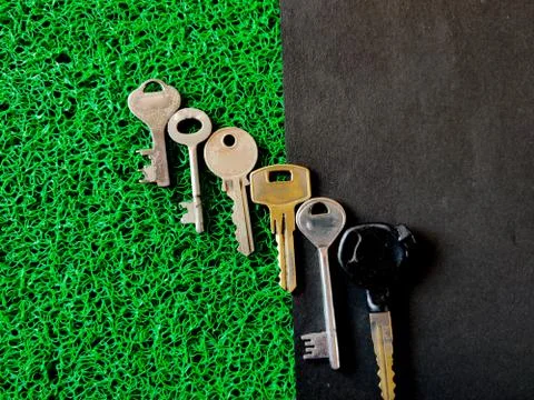 Set of keys in different sizes which includes house keys and bike key isolate Stock Photos