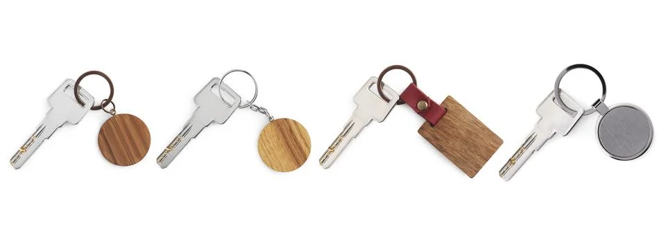 Set of keys with key chains isolated on white Foto stock
