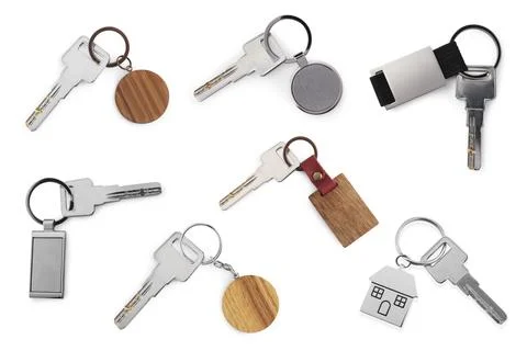 Set of keys with key chains isolated on white Foto stock