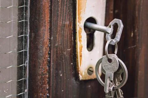 Set of keys in an old rustic lock Stock Photos