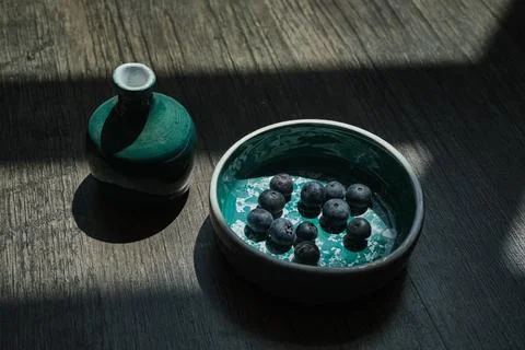 Set of kitchen ceramic tableware on a table. Eco style home still life. 写真素材