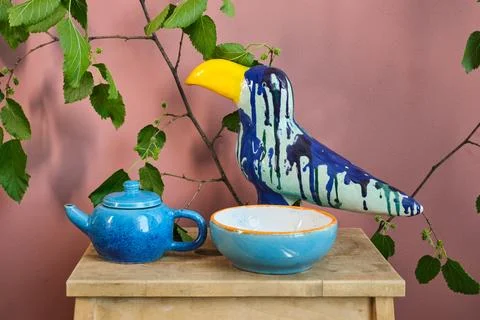 Set of kitchen ceramic tableware on a table. Eco style home still life. Stock-Fotos