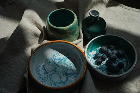 Set of kitchen ceramic tableware on a table. Eco style home still life. 写真素材