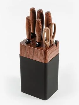Set of kitchen knives on a stand. White background. Stock Photos