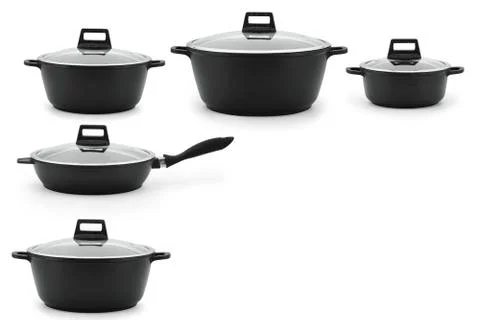 Set of kitchenware cast iron black steel isolate white background. Stock Photos