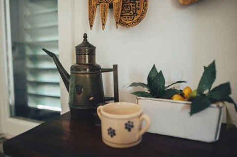 Set of kitchenware in wooden table in dining room Stock Photos