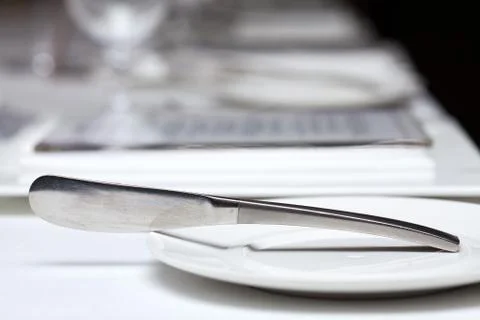 Set up knife on the table for dinner at restaurant Stock Photos