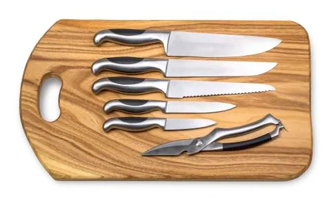 Set of knifes on board Stock Photos