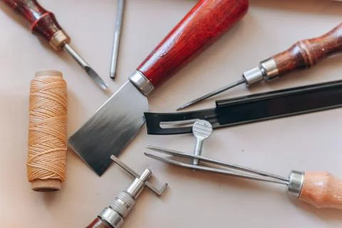 Set of leathercraft tools - Slickers, Nylon hammers, Edge Creaser, Burnishers Stock Photos