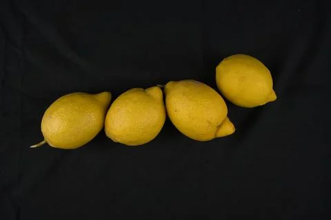 Set of lemons with black background Stock Photos