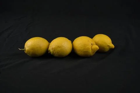 Set of lemons with black background Stock Photos