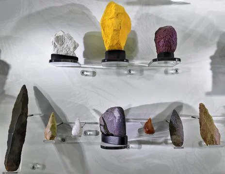 Set of lithic tools in display: ochres-facial points-ground hatchet. Darwin-AUS Stock Photos
