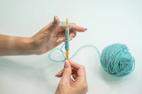 Set of loops on the needles step by step. wool and cotton knitting Stock Photos