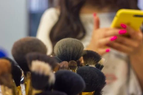 Set of make up artists brushes on the table Stock Photos