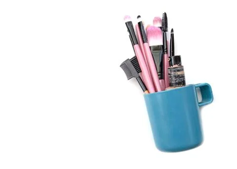 Set of make-up brushes in old cup Stock Photos