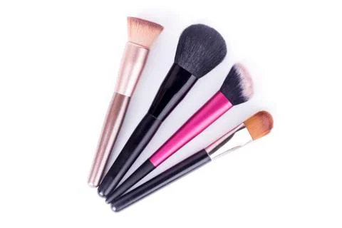 Set of makeup brushes isolated on white background closeup Stock Photos