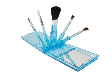 Set of makeup brushes with mirror Stock Photos