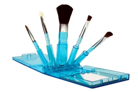 Set of makeup brushes with mirror Stock Photos