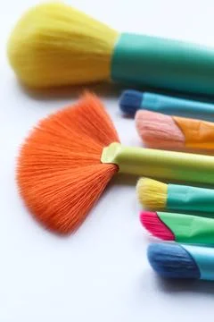 Set of makeup brushes on white background. Stock Photos