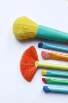 Set of makeup brushes on white background. Stock Photos