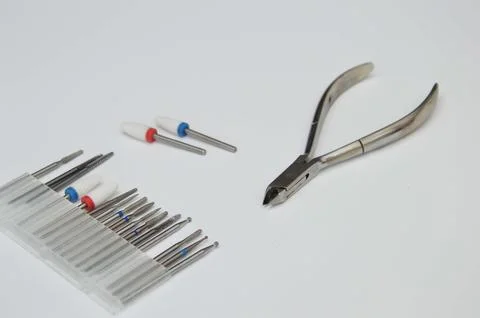 A set of manicure tools on a white background - cuticle nippers and cutters.. Stock Photos