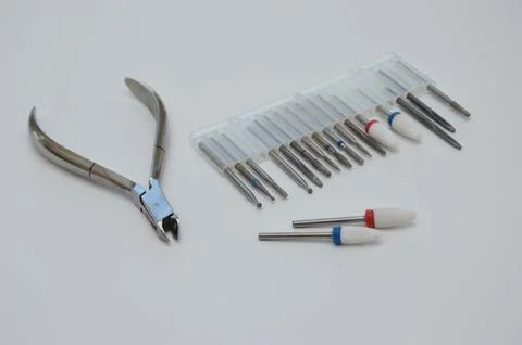 A set of manicure tools on a white background - cuticle nippers and cutters. Stock Photos