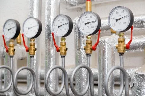 Set of manometers in industrial heating system in a boiler room Stock Photos