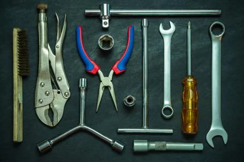 Set of many hand tools on cement floor. Stock Photos