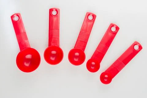 Set of measuring spoons on white background Stock Photos