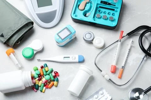 Set of medical objects on grey background, above view Fotos de archivo