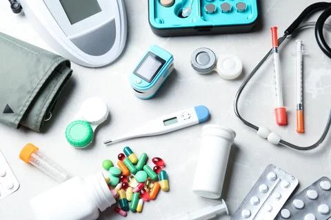 Set of medical objects on grey background, above view Fotos de archivo