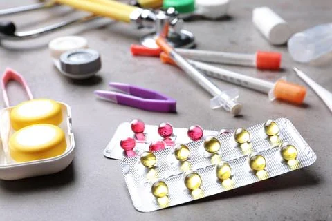 Set of medical objects on grey table Stock Photos