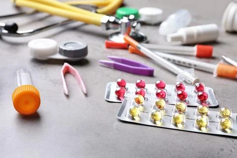Set of medical objects on grey table Stock Photos