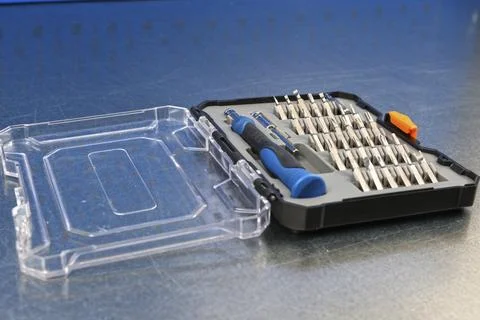 A set of metal bits for installation work in a plastic case. Stock Photos