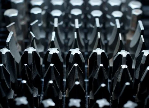 Set of metal bits for a screwdriver Stock Photos