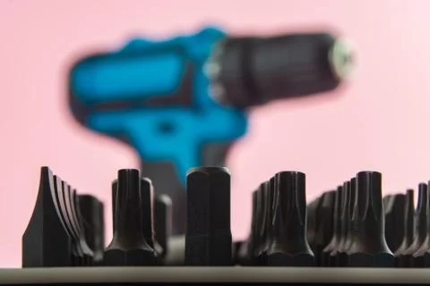 A set of metal bits for a screwdriver in plastic packaging Stock Photos